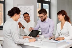 Employees in Office Meeting