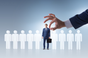 Man in suit being selected