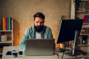 man working in laptop