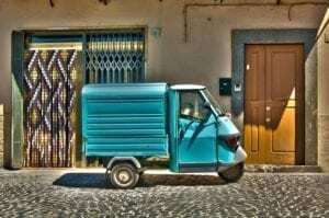 Small blue 3 wheel vehicle